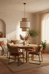 Candeeiro Suspenso LUJAR em rattan e tecido branco em ambiente boho mediterrâneo — tons terracota com luz quente filtrada pelo rattan